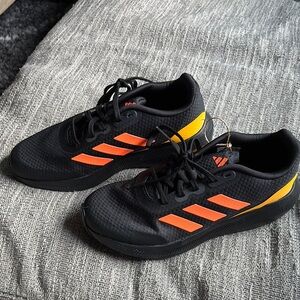 Adidas Black Sneakers with Orange and Yellow Accents